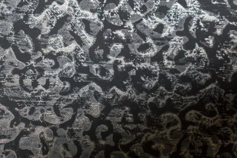 Abstract creative background: figured plaster made with a pattern roller, ton Stock Photos