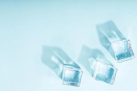 Abstract creative background with ice cubes and water drops. Stock Photos