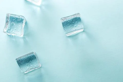Abstract creative banner with ice cubes and water drops. Stock Photos