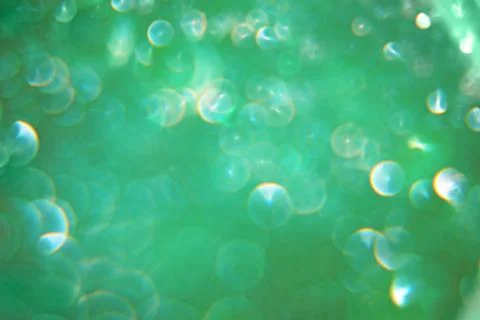 Abstract creative green bubble background. Fairy, magic Stock Photos