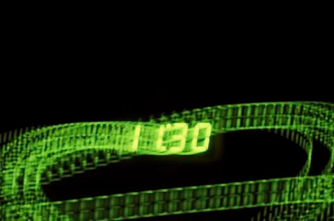 Abstract creative light long exposure of digital time 11:30 Stock Photos