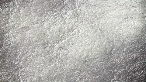 Abstract crumpled metal surface motion background seamless loop Video stock 69878108