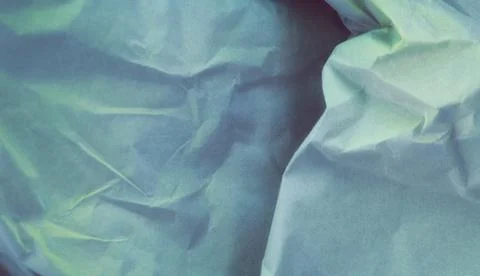 Abstract Crumpled Paper Texture With Soft Blue Green Gradient Stock Photos
