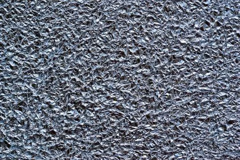 Abstract crumpled texture of a foil Foto stock