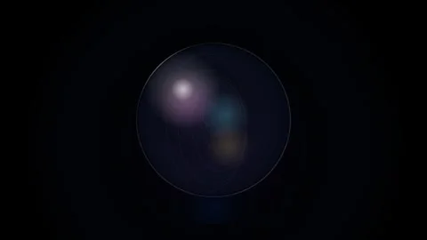 Abstract crystal orb glowing in dark space with rotating light reflections .. Видео 345574083