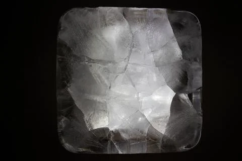 Abstract crystalline structure with dramatic lighting and a dark background 스톡 사진