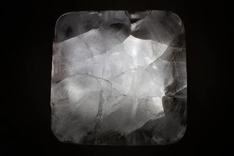 Abstract crystalline structure in a square frame against dark background Stock Photos