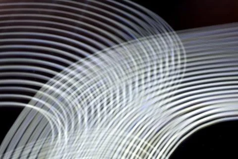Abstract curved white light lines. Stock Illustration