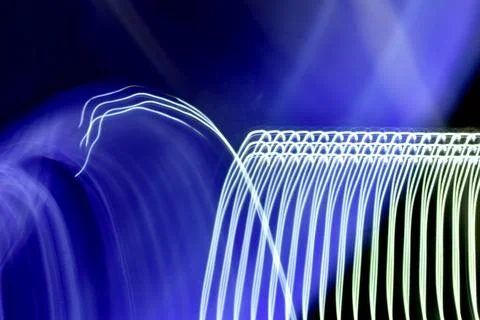 Abstract curved white light lines. Stock Photos