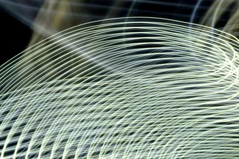 Abstract curved white light lines. Stock Photos