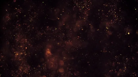 Abstract dark background with chaotical motion of glimmering green-gold bubbles Stock Footage 107724457