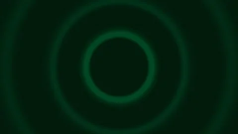 Abstract dark background with concentric glowing green circles in the center Stock Footage 335145834