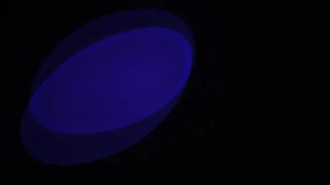 Abstract dark background with floating blue light flare bokeh effect moving.. Stock Footage 346320184