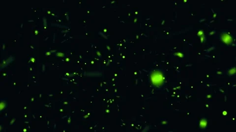 Abstract dark background with flowing bright green dust particles animation.. Stock Footage 327510797