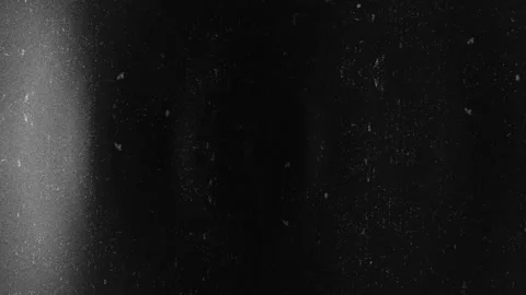Abstract dark background with a glowing horizontal light streak and subtle .. Stock Footage 346559513
