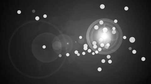 Abstract dark background with glowing light flare and floating coin icons a.. 스톡 동영상 337872600