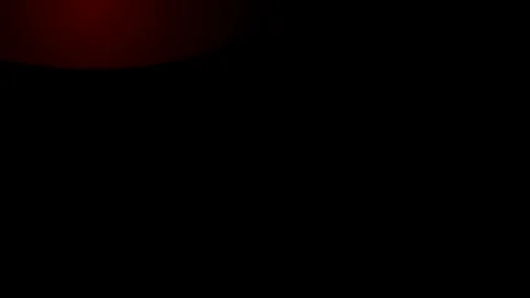 Abstract dark background with glowing orange light Видео 346234314