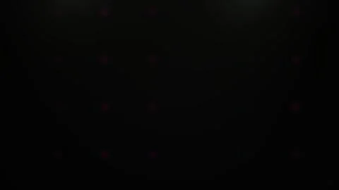 Abstract Dark Background with Grid of Dim Red Led Dots Pulsing Across Black.. Stock Footage 344713499