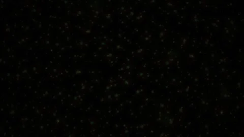 Abstract dark background with scattered light particles. Видео 334430350