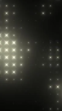 Abstract dark background with soft golden star-like light flares, creating .. Stock Illustration