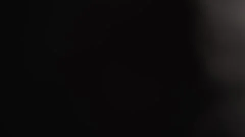 Abstract dark background with subtle shadows and minimal lighting, creating a 库存影片 341040036
