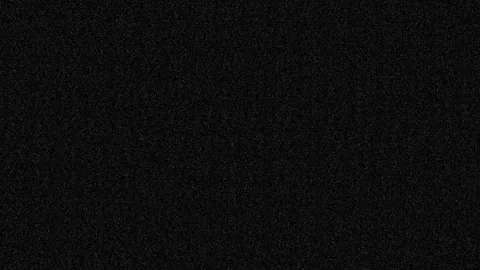 Abstract dark background with subtle shimmering particles and light speckle.. Stock Footage 337958858