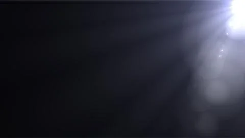 Abstract dark background with top right lens flare and soft glowing light b.. Stock Photos