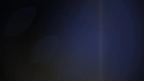 Abstract dark blue and black gradient background with subtle light flare. Stock Footage 340487262