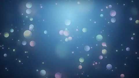 Abstract dark blue background with floating iridescent soap bubbles light Video stock 342798334