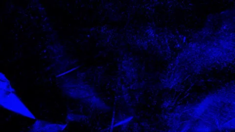 Abstract dark blue background with scattered particles and glowing dust textu Stock Footage 346559577