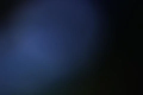 Abstract dark blue gradient background with soft light texture Stock Photos