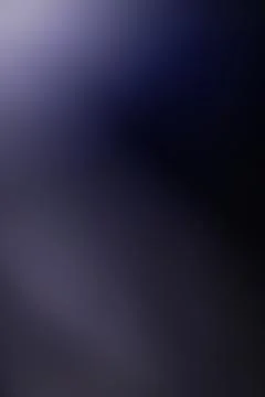 Abstract dark blue gradient background with soft light flare Stock Photos