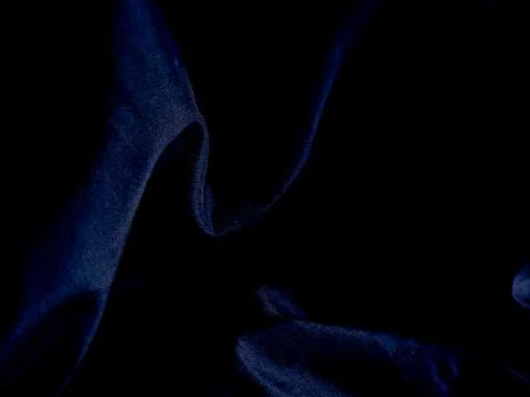 Abstract Dark Blue Wispy Smoke Patterns on Black Background. Stock Photos