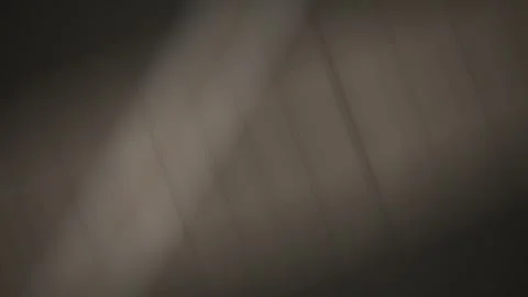 Abstract dark blur with vertical lines creates a mysterious, unsettling Stock Footage 327942696