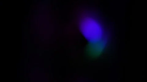 Abstract dark bokeh background with blue and purple glow 库存影片 334285563