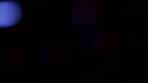 Abstract dark bokeh lights background with blue glow, Dark background with .. 库存影片 334285456