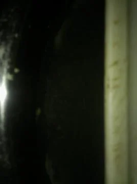 Abstract dark gray particles background with different elements in space in c Stock Photos