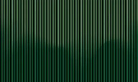 Abstract dark green background with 3D fluted vertical texture and wavy gra.. Illustration