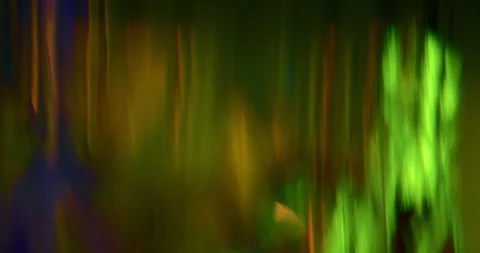 Abstract Dark Green Background with Moving Lens Flares and Anamorphic Bokeh Stock Footage 340482489