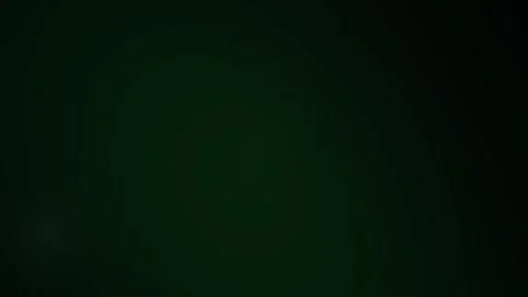 Abstract Dark Green Background with Subtle Light Leaks and Texture. Stock Footage 340487694