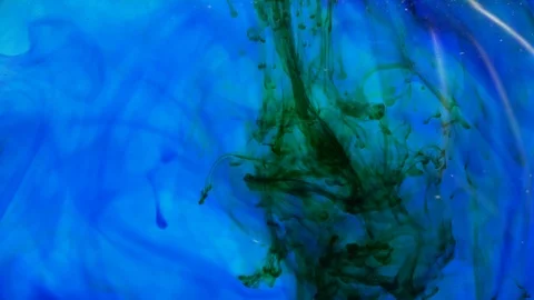 Abstract  Dark Green Paint Drops In Blue Water Video stock 110917459