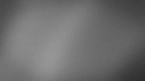 Abstract dark grey and silver grainy gradient background with fine noise te.. Illustrazione stock