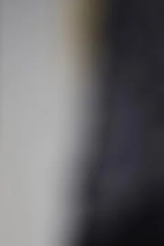 Abstract dark grey and white gradient background with soft blurred light tr.. Stock Photos