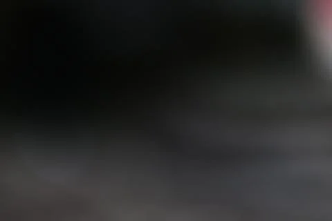 Abstract dark grey background with soft blurred gradients and moody lightin.. Stock Photos