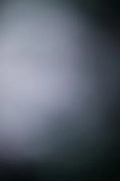 Abstract dark grey gradient background with soft blurred lighting texture Stock Photos