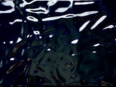 Abstract dark liquid surface with glossy ripples and luminous reflections cre Stock Photos