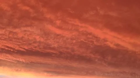 Abstract dark red background. Dramatic red sky. Red sunset with clouds Foto stock