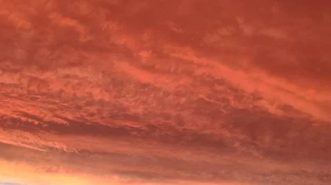 Abstract dark red background. Dramatic red sky. Red sunset with clouds Foto stock
