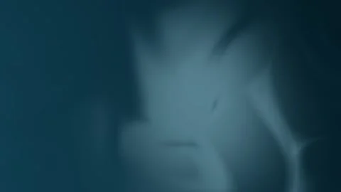 Abstract dark teal background with soft blurred shapes, seamless loop. 4K. Stock Footage 300840464