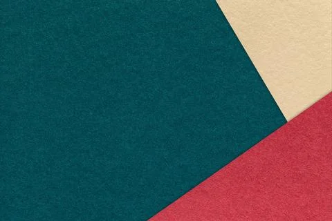 Abstract dark teal, red, light beige paper background with copy space. Temp.. Stock-Fotos
